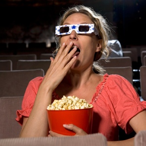 woman-eating-popcorn-at-movies.jpg